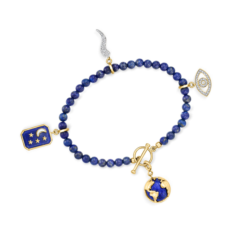 Lapis blue bead bracelet with gold toggle plus moon-star and globe charms