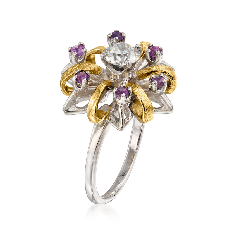 Two-tone gold ring with round diamond center and purple amethyst stones