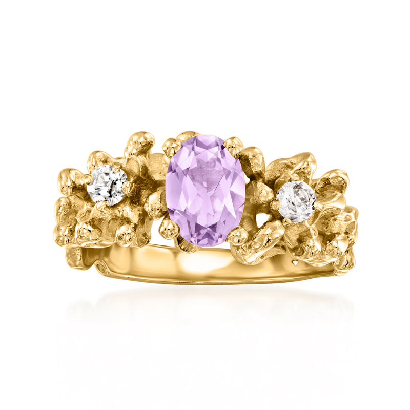 Vintage amethyst and diamond ring in 14kt yellow gold with oval purple center stone