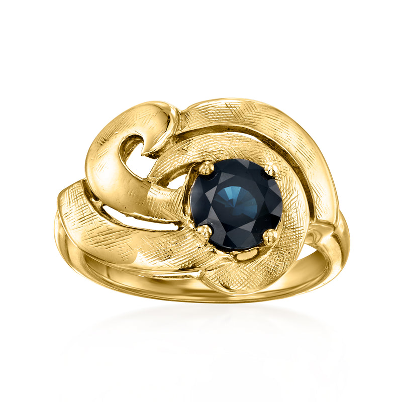 Vintage swirl ring in 14kt yellow gold with dark blue oval gemstone
