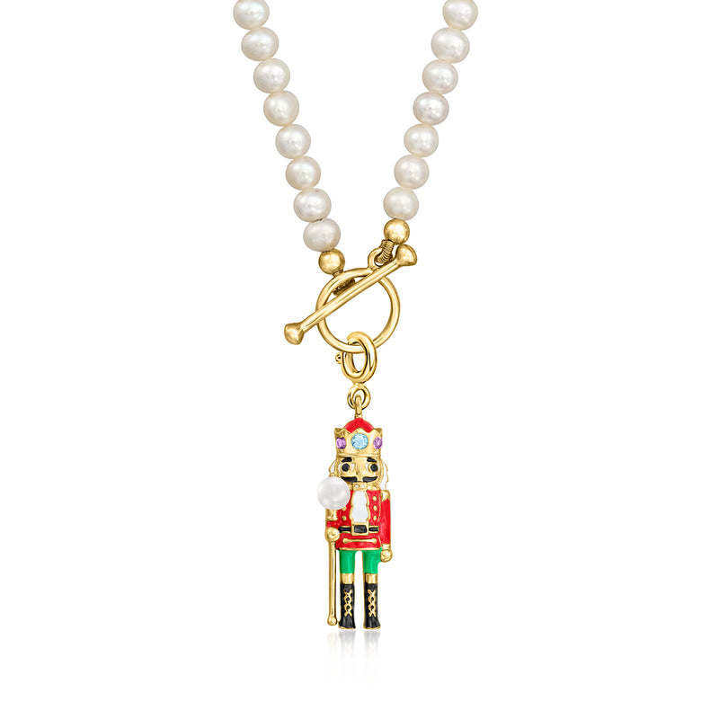 Nutcracker charm on gold-tone bail with white cultured pearl strand and multicolored enamel
