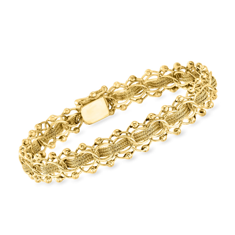 Vintage 14kt yellow gold wheat-chain circle-link bracelet with polished gold links.
