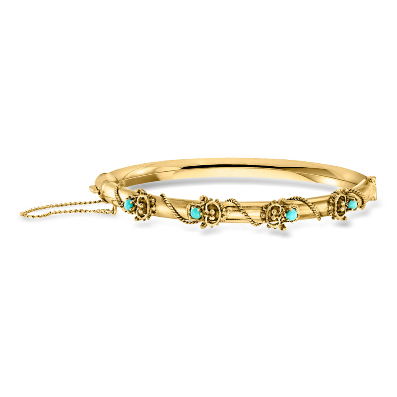 Gold bangle bracelet with turquoise cabochons and filigree accents, with chain extension