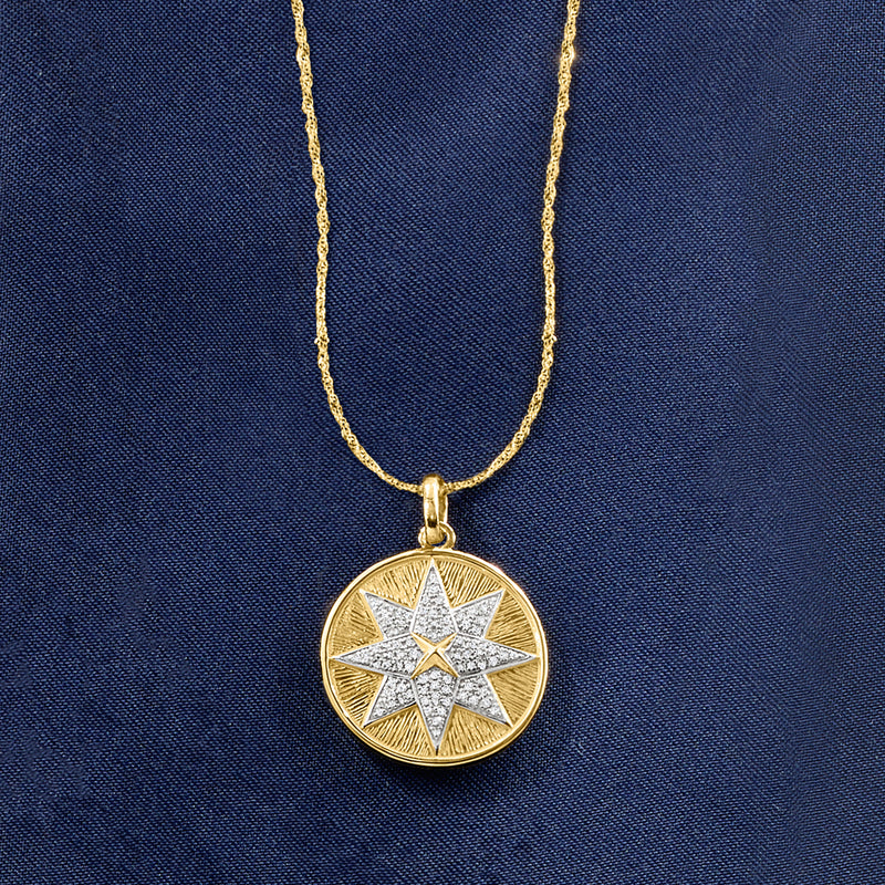 14kt yellow gold starburst diamond pendant with thin chain and round starburst setting