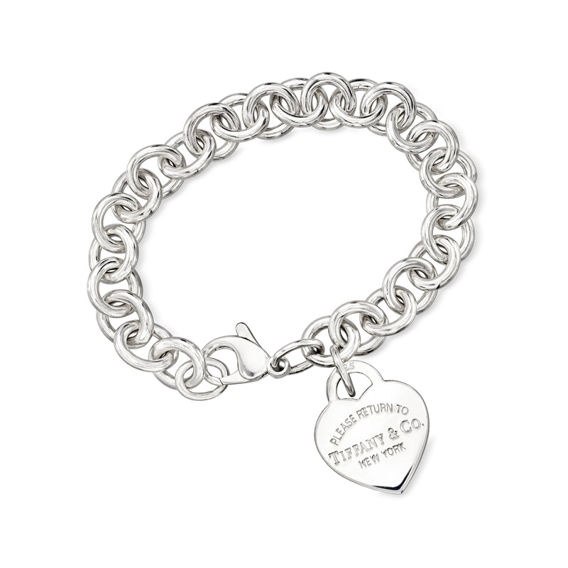 Sterling silver chain bracelet with heart charm and engraved clasp