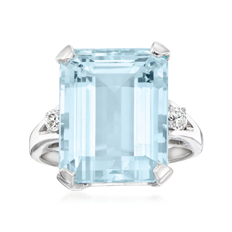 14kt white gold vintage ring with large square aquamarine center and diamond side stones