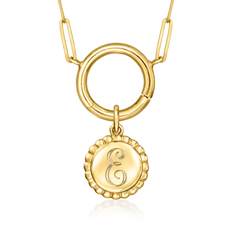 Gold scalloped circle charm with engraved G hanging from chain links