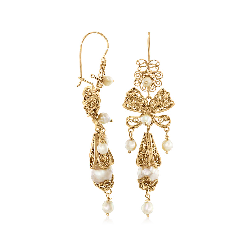 Pair of 14kt yellow gold drop earrings with scroll details and dangling white pearls