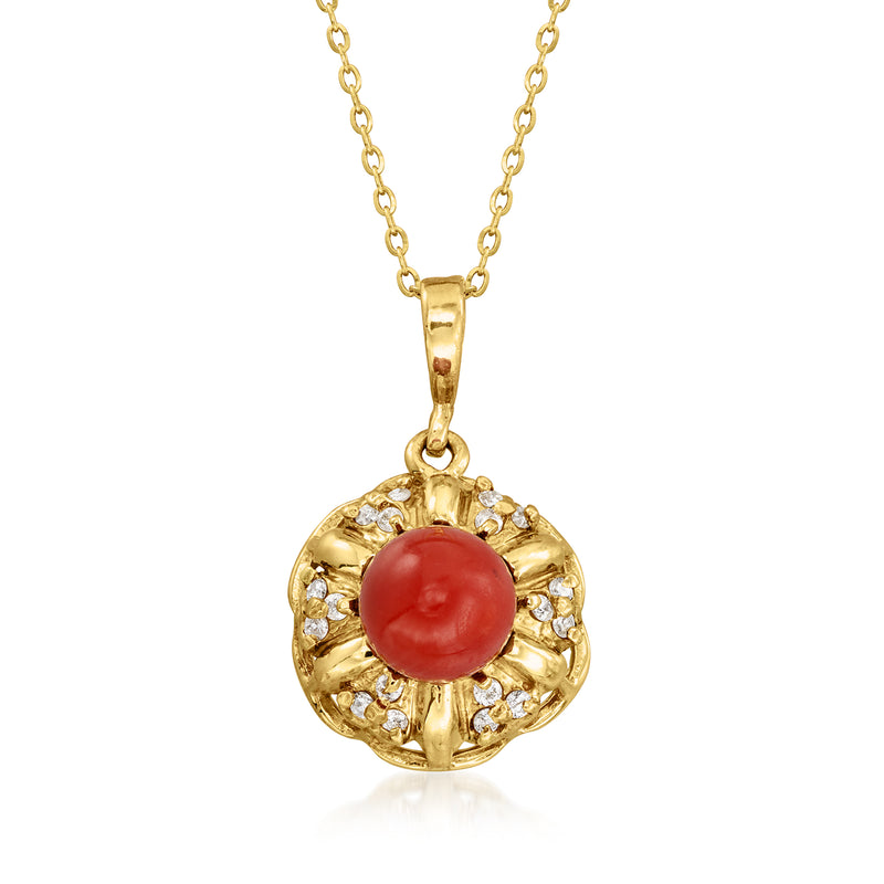 18kt yellow gold pendant necklace with red coral cabochon and diamond halo