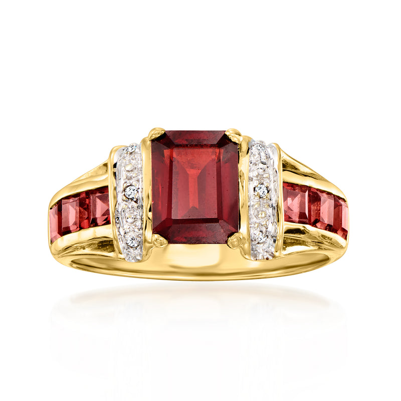 10kt yellow gold vintage ring with dark red rectangular garnet center and diamond side stones