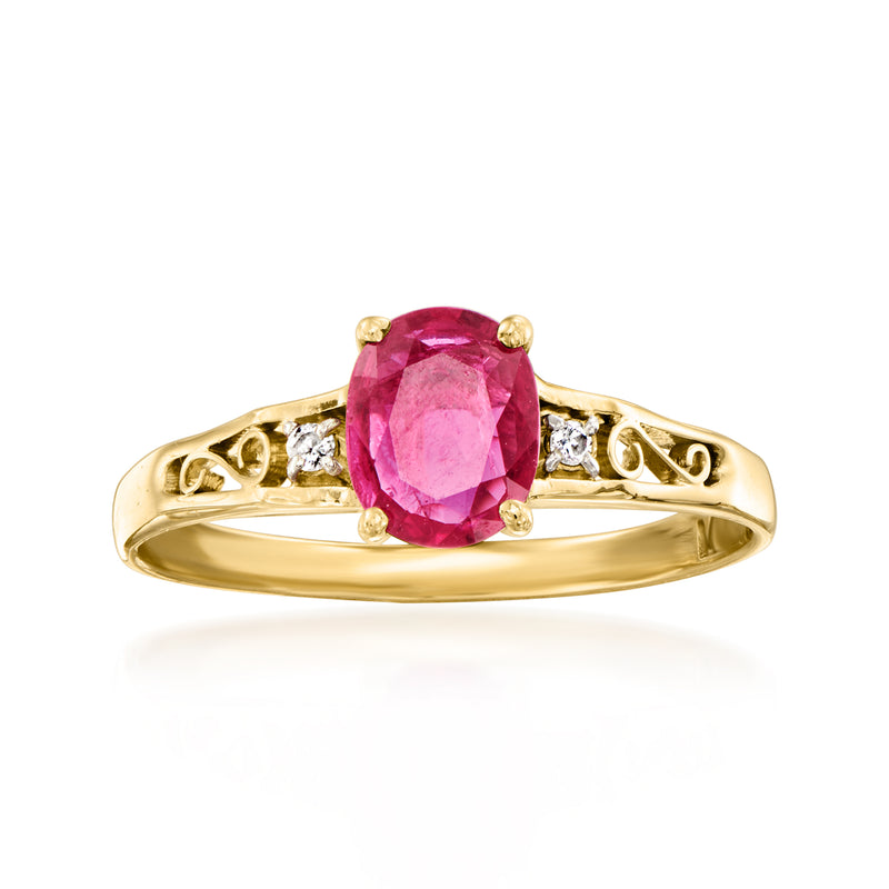 Vintage ruby and diamond ring in 14kt yellow gold, oval pink-red stone with diamond sides