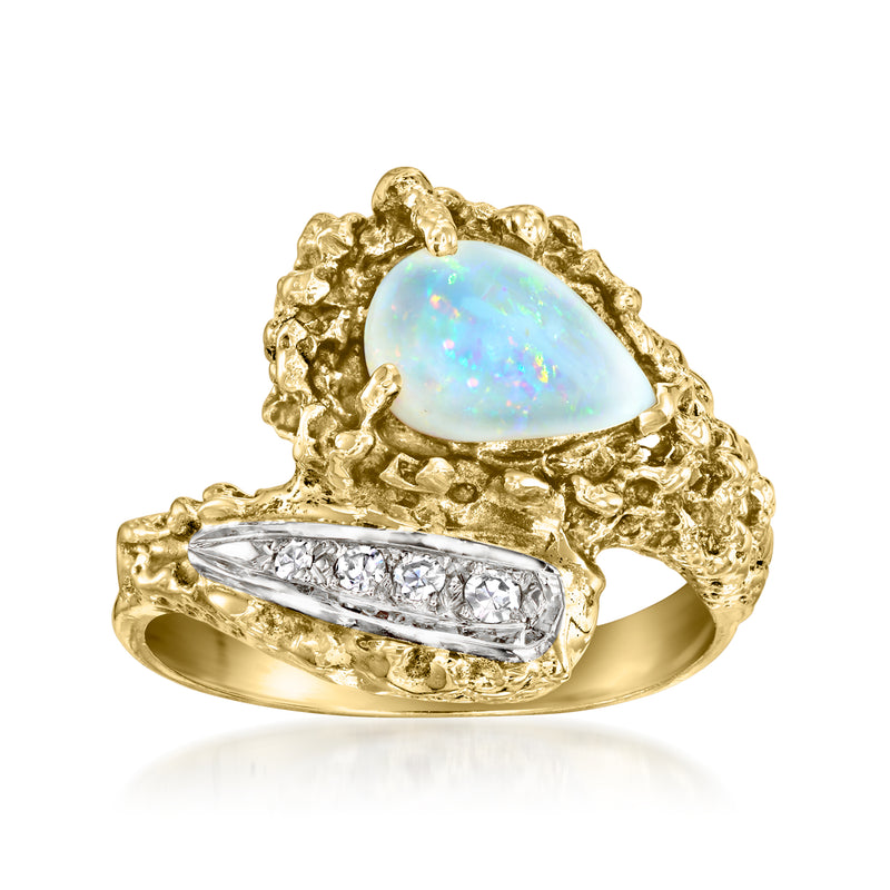 14kt yellow gold opal and diamond bypass ring with pear-shaped opal centerpiece