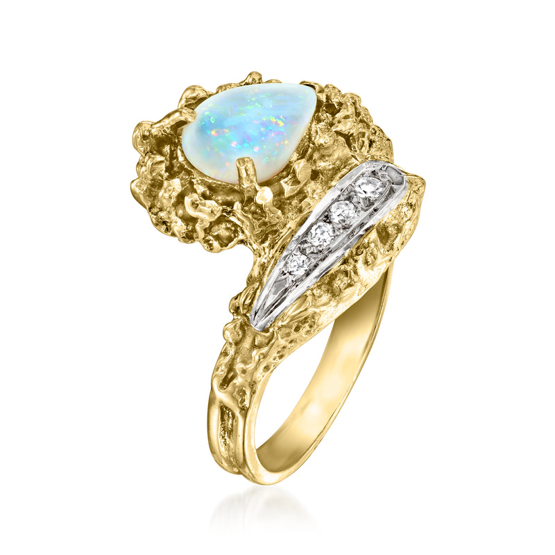 14kt yellow gold ring with bezel-set pear opal and diamond accents in bypass design