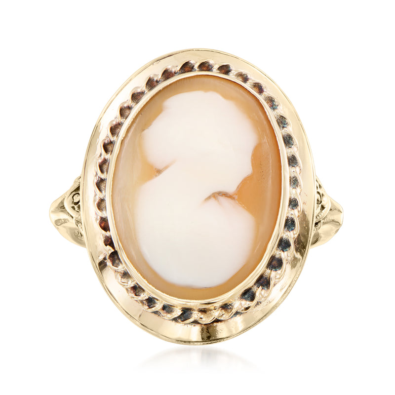 10kt yellow gold oval shell cameo ring with brown-toned bezel and dark stones