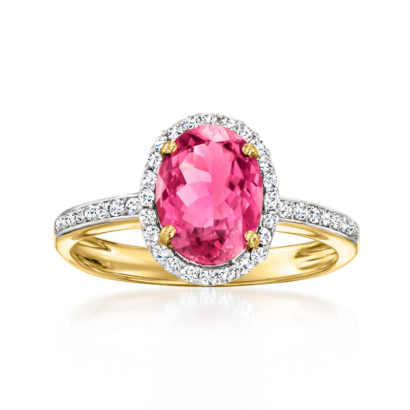 14kt yellow gold ring with oval pink tourmaline and diamond halo and accents