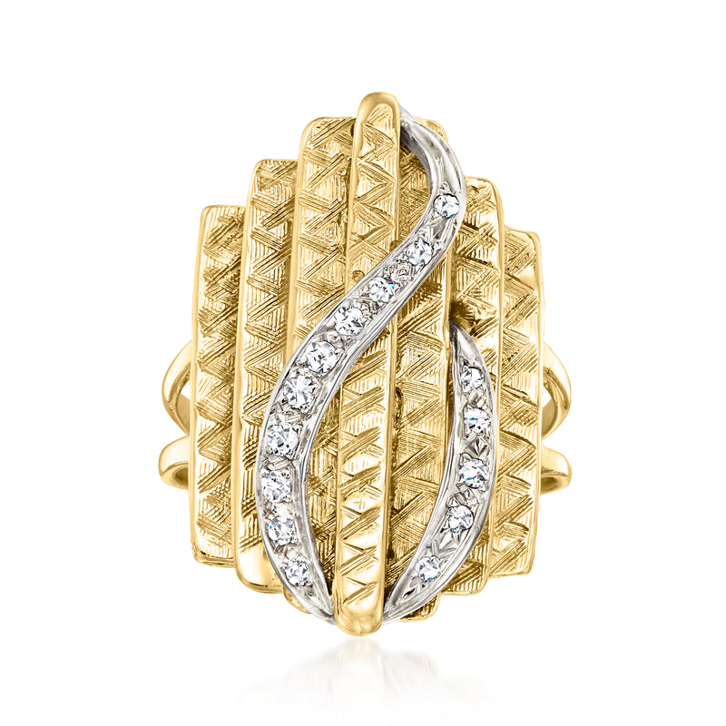 Two-tone gold swirl ring with diamond accents and textured vintage-style frame