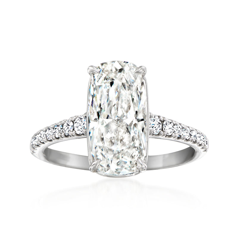 Platinum lab-grown diamond ring with oval center stone and pavé band