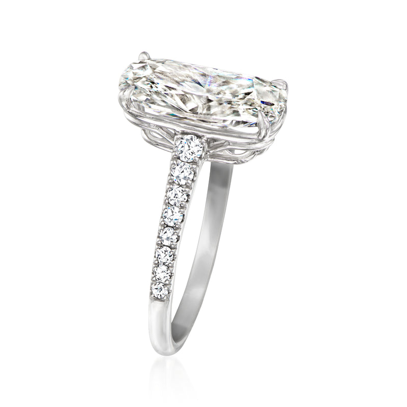 Platinum lab-grown diamond ring with oval center stone and pavé band