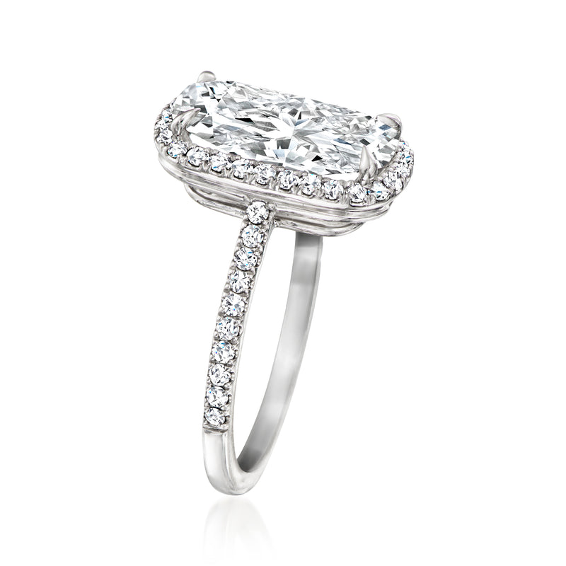 Platinum cushion-shaped lab-grown diamond ring with pavé band