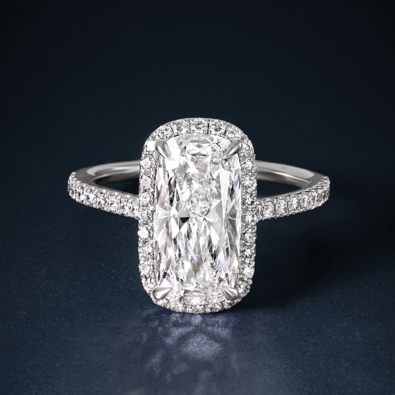 Platinum ring with cushion-shaped lab-grown diamond and pavé band
