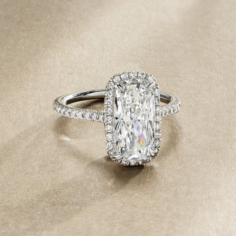 Platinum cushion-cut lab-grown diamond ring with halo and pavé band