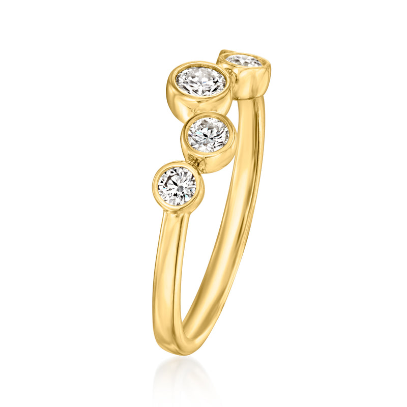 Gold bezel-set bubble ring with three round diamonds, side view