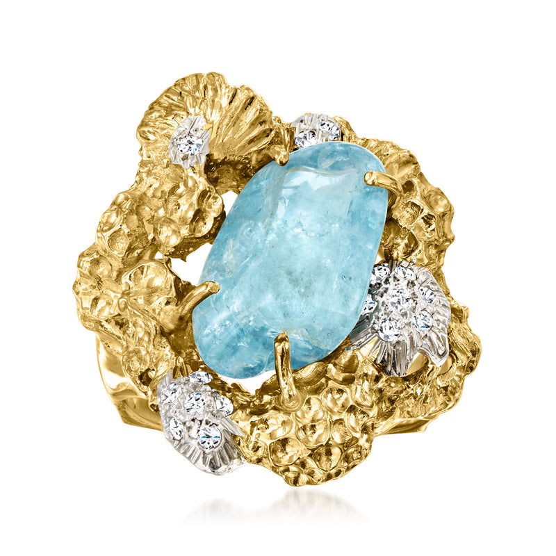 Vintage oval aquamarine gemstone ring with diamond accents in yellow gold setting