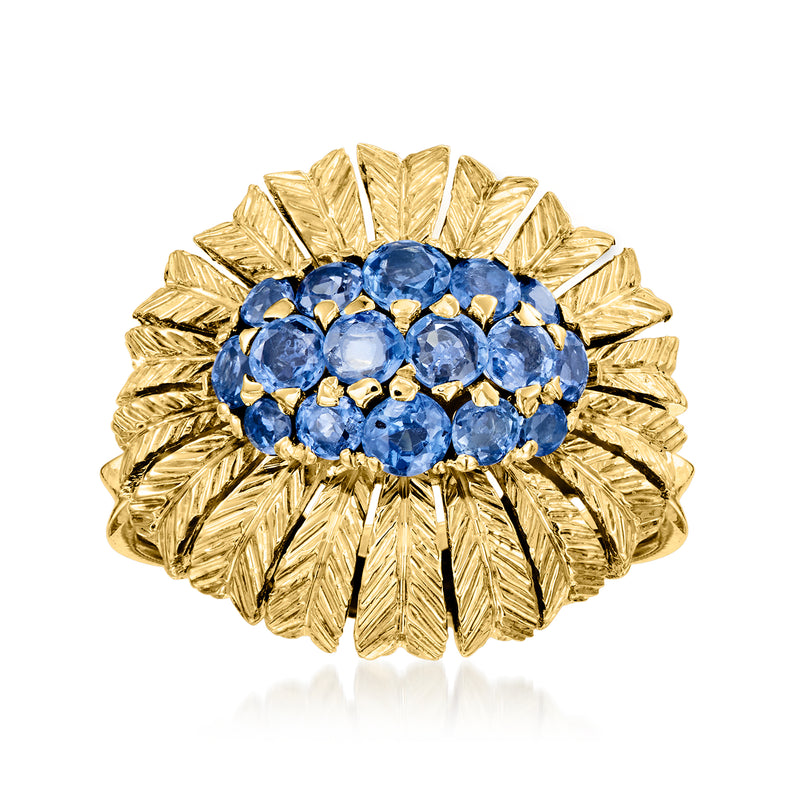 18kt yellow gold sapphire feather ring, close-up of blue round gemstone cluster