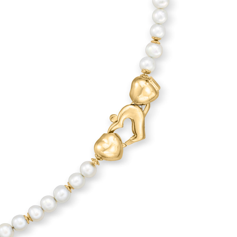 Cultured pearl bead necklace with gold star charm detail
