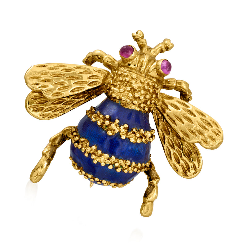 Gold-tone bee pin with blue enamel wings and ruby-red accents, raised body detail