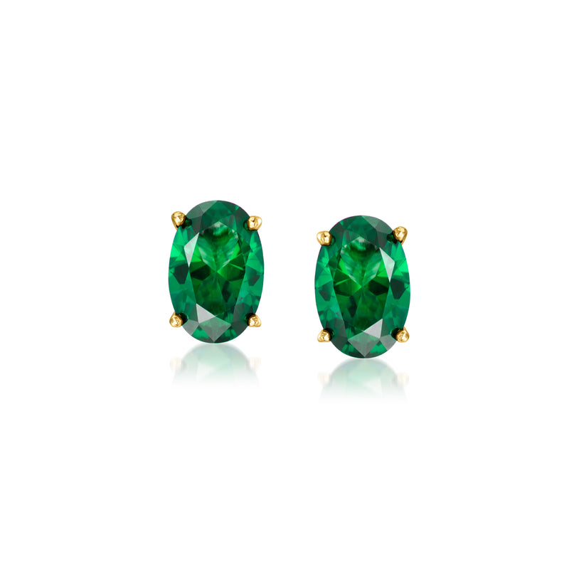 Oval green emerald stud earrings in gold vermeil with faceted bezel settings