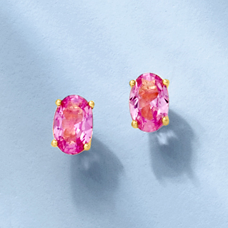 Oval pink sapphire stud earrings, gold vermeil four-prong oval stones.