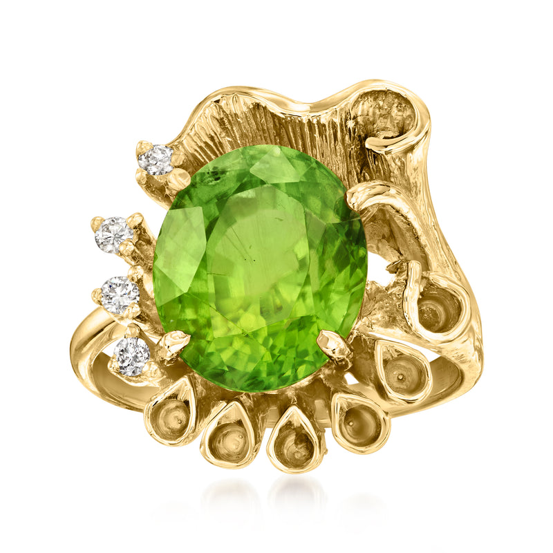 Vintage 14kt yellow gold ring with oval green peridot center and diamond accents