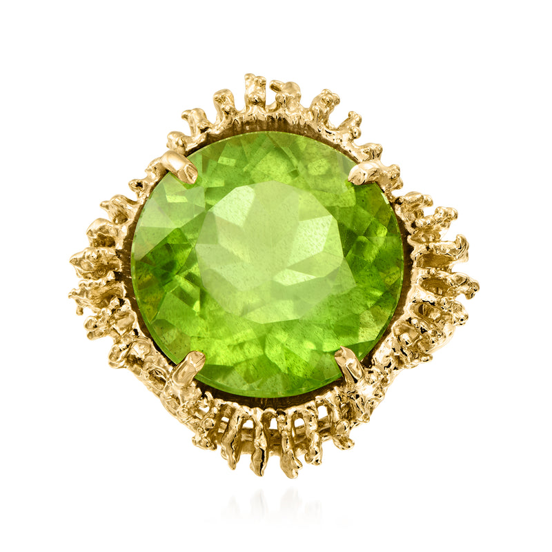 Vintage 14kt yellow gold ring with large round green peridot gemstone halo setting