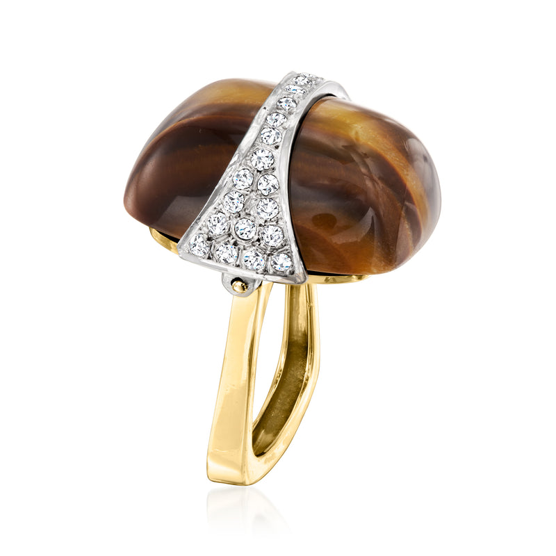 Two-tone gold ring with oval tiger eye cabochon and diamond-set overband