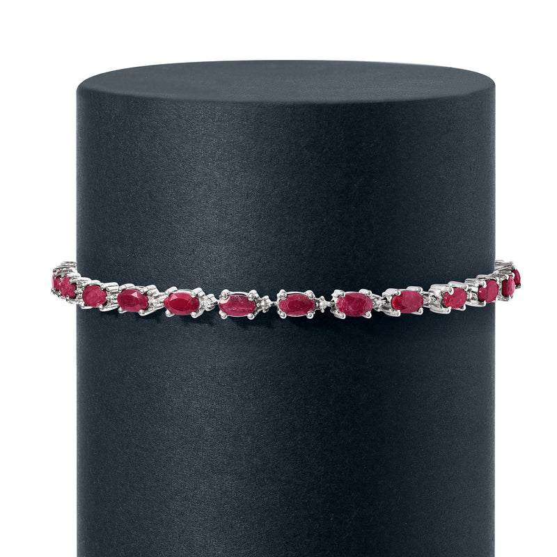 Sterling silver ruby and diamond bracelet, oval ruby row with small clear stones