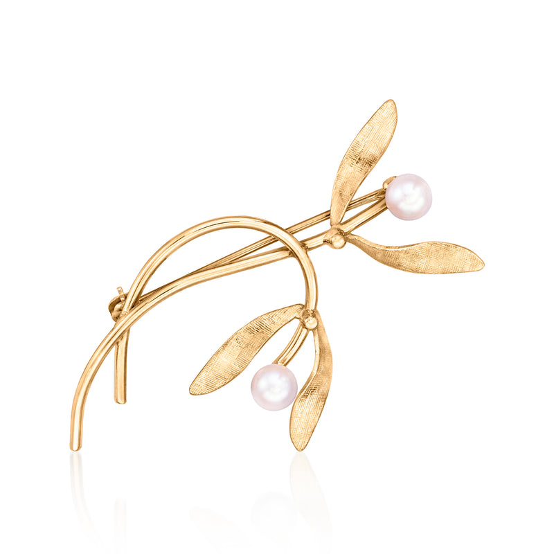 Yellow gold leaf pin with two round cultured pearls, curved wire design