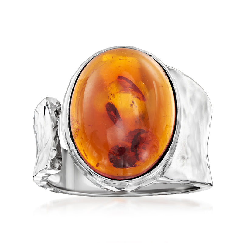 Sterling silver open-wrap ring with oval amber cabochon, hammered band