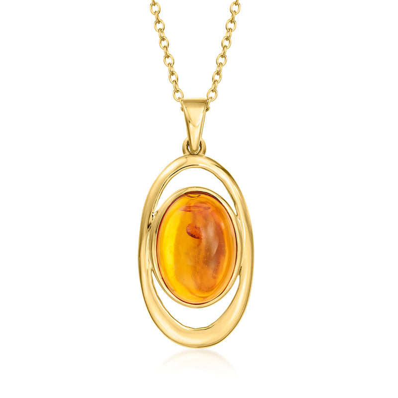 Oval amber pendant necklace with gold-tone oval frame and amber cabochon
