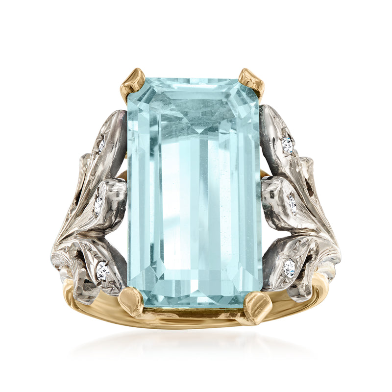 Vintage aquamarine diamond ring with emerald-cut stone, 2-tone 14kt gold setting.