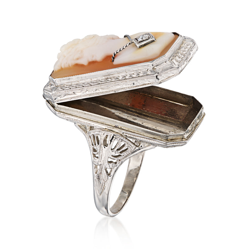 Vintage cameo locket ring underside view with open frame and oval shell centerpiece
