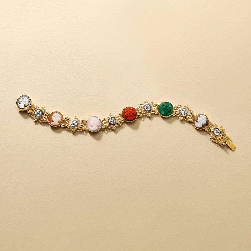 14kt yellow gold charm bracelet with round and oval cameos and multicolor stones