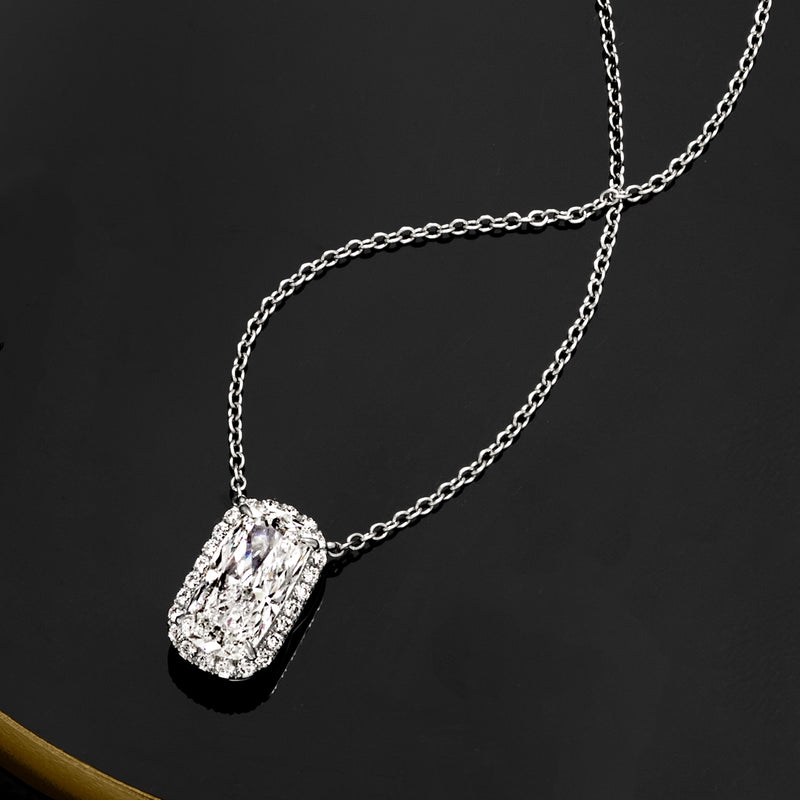Platinum lab-grown diamond necklace with cushion-cut pendant and halo-like setting