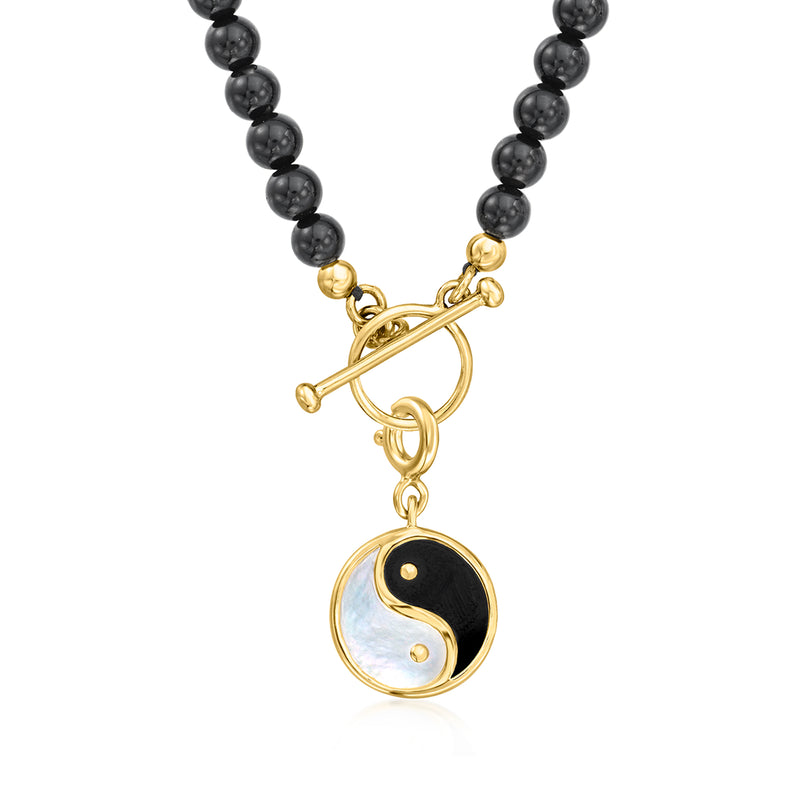 Yin-yang charm on black bead necklace in gold over sterling, round mother-of-pearl onyx