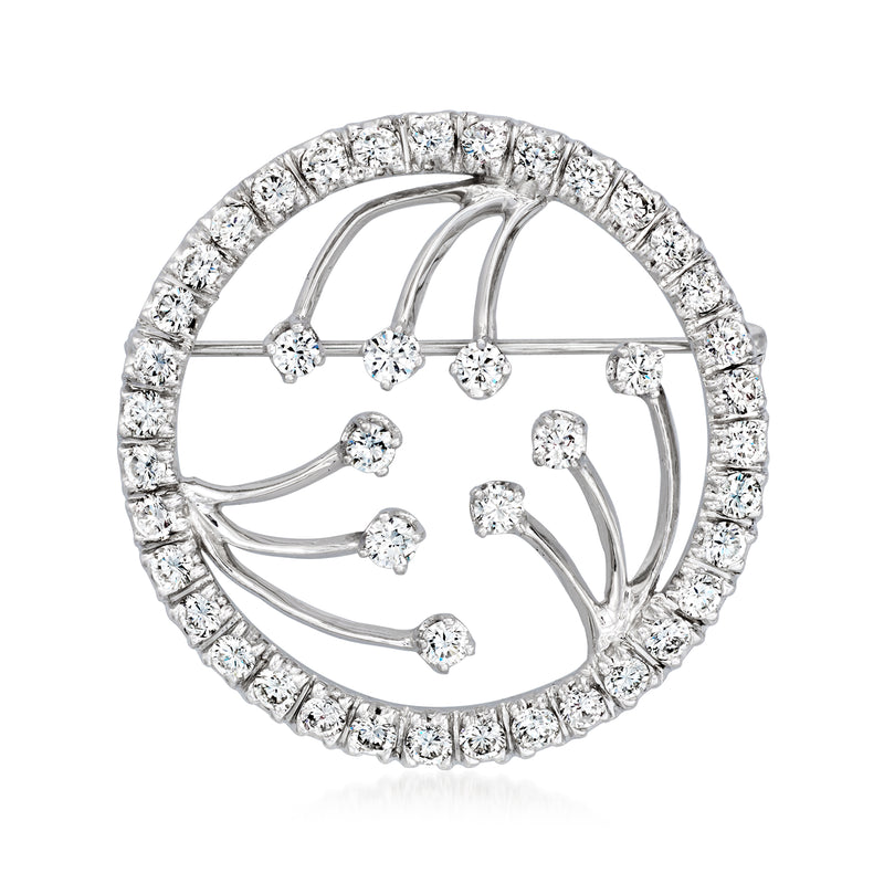 White gold diamond circle pin with halo border and small round prong-set stones