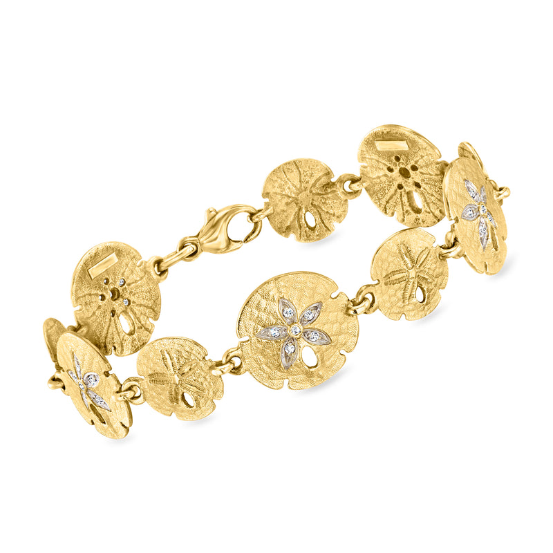 14kt yellow gold sand dollar charm bracelet with diamond-like stones, link chain