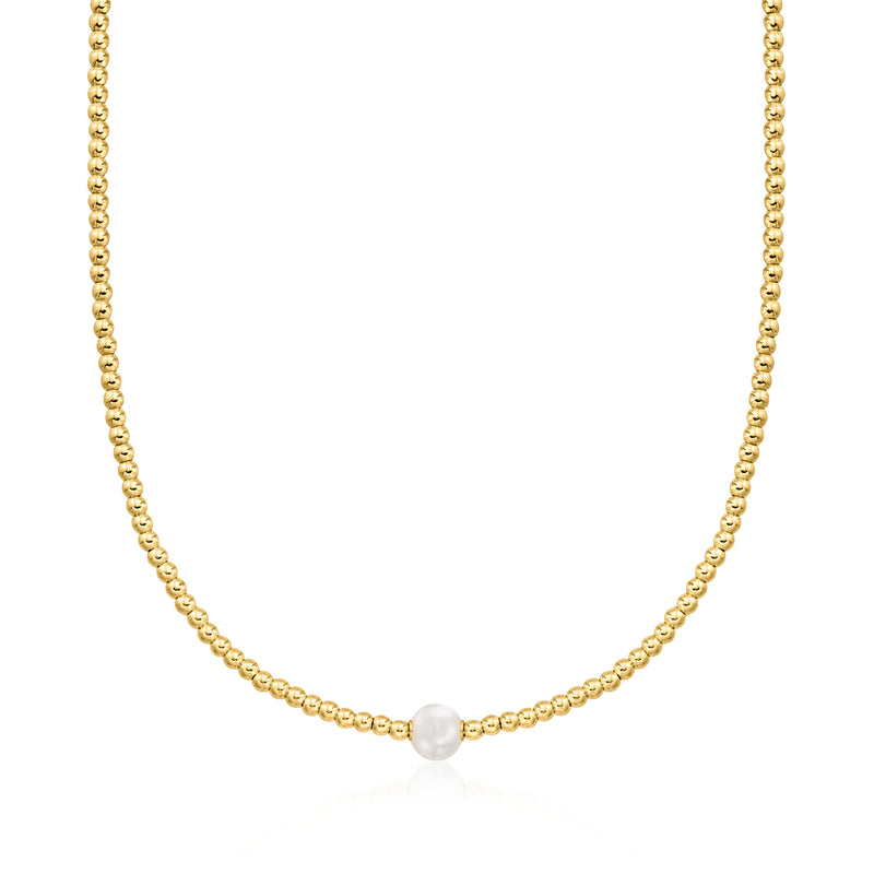 Gold bead necklace with small white cultured pearl centerpiece on delicate chain