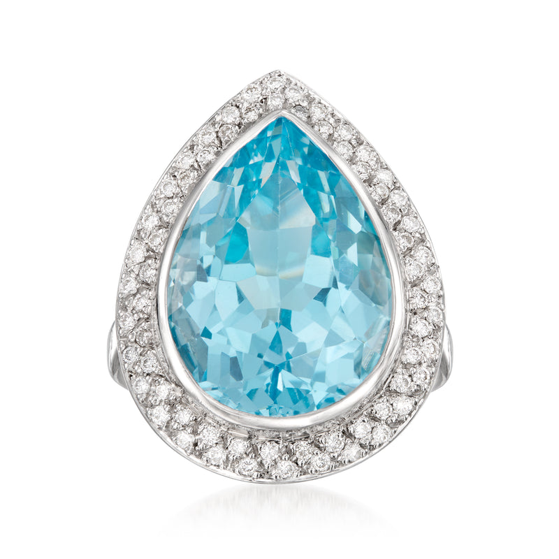 Vintage cocktail ring: pear-cut blue topaz, diamond halo, 18kt white gold setting
