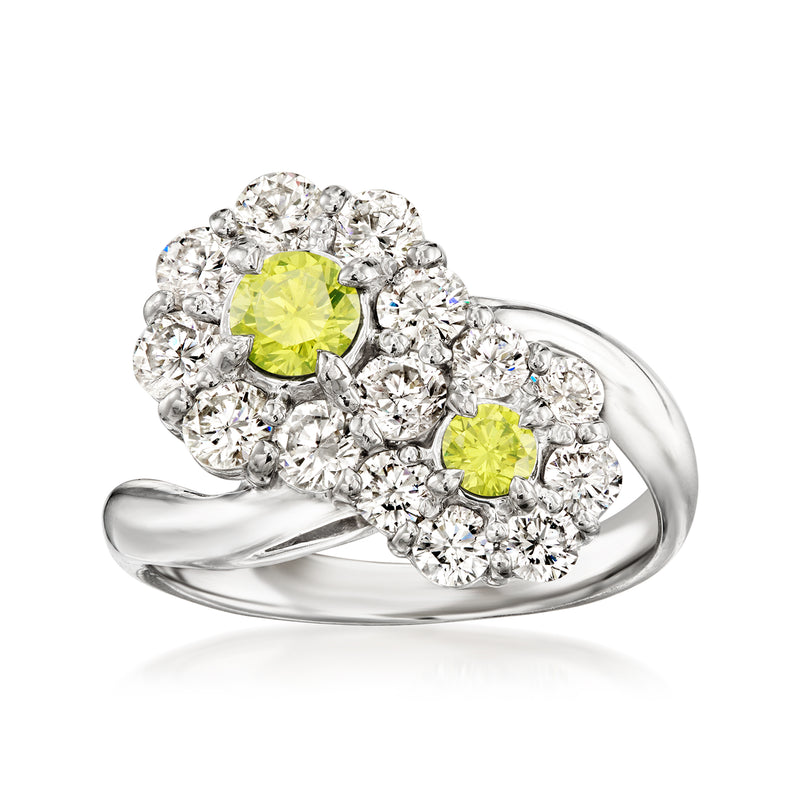 Platinum flower-style diamond ring with round yellow center stones and white diamond halo accents.