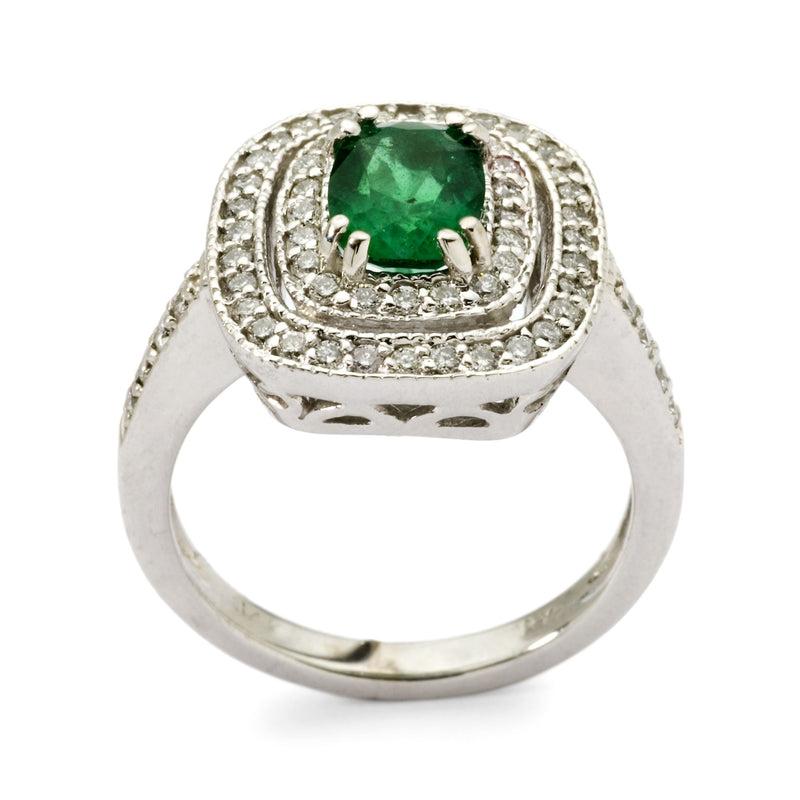 14kt white gold ring with green emerald center and diamond halo